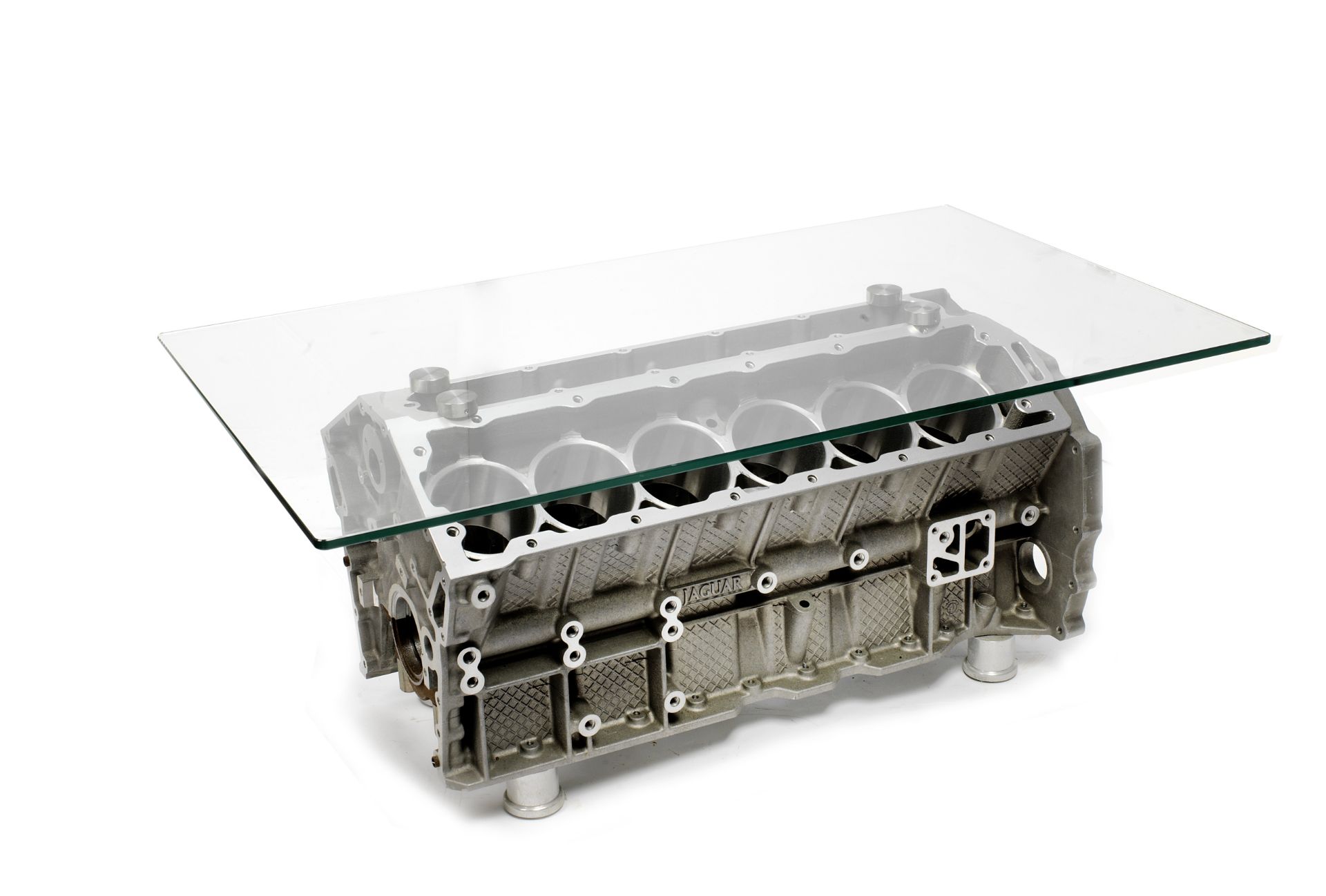 A V-12 Jaguar engine block coffee table,