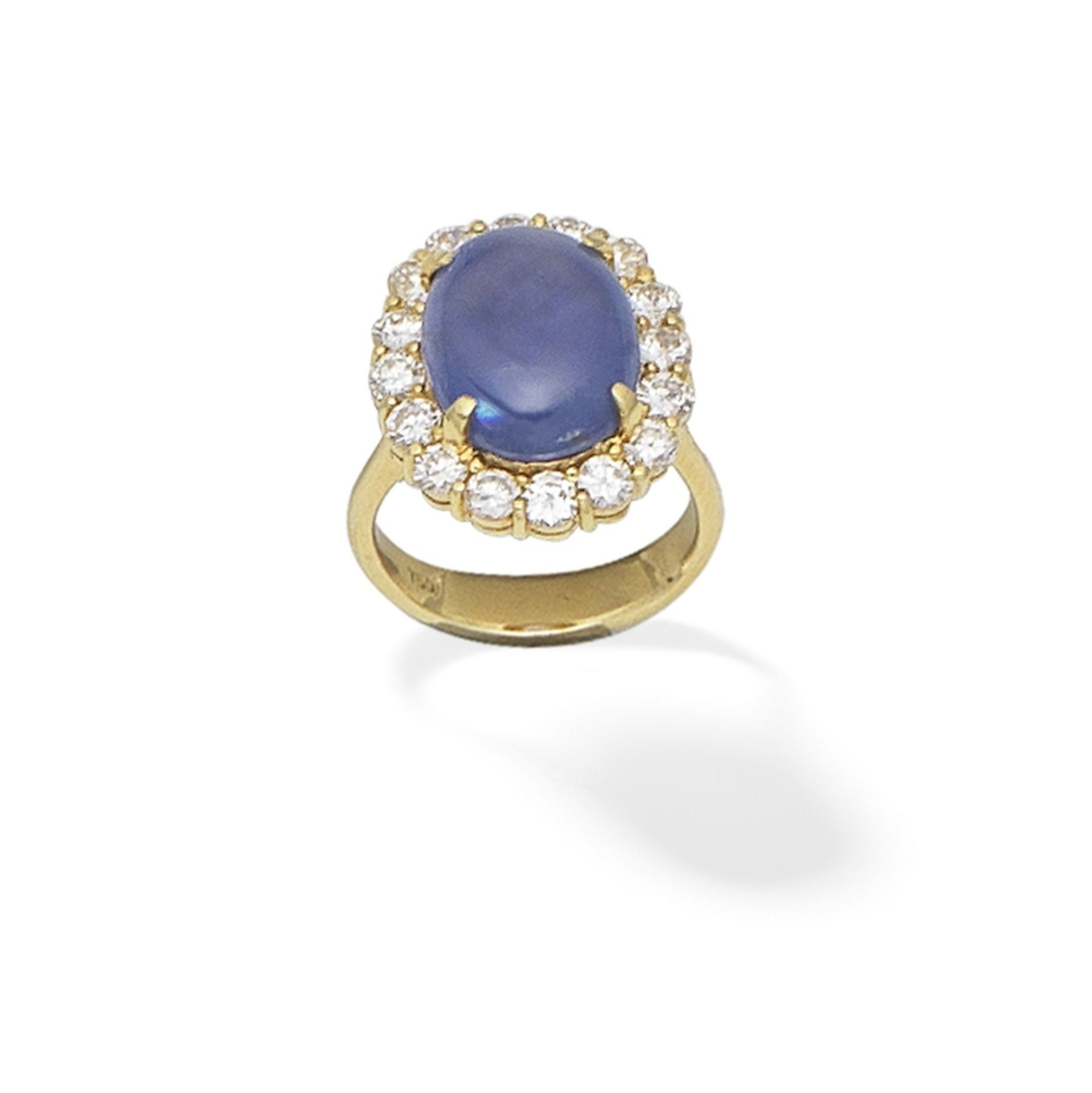 STAR SAPPHIRE AND DIAMOND CLUSTER RING