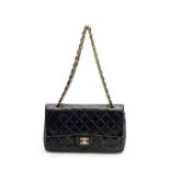 Black Lambskin Classic Double Flap Bag, Chanel, c. 1994-96, (Includes serial sticker, authenticit...