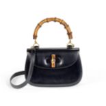 Black Classic Bamboo Bag, Gucci, 1990s, (Includes shoulder strap and round mirror with leather case)