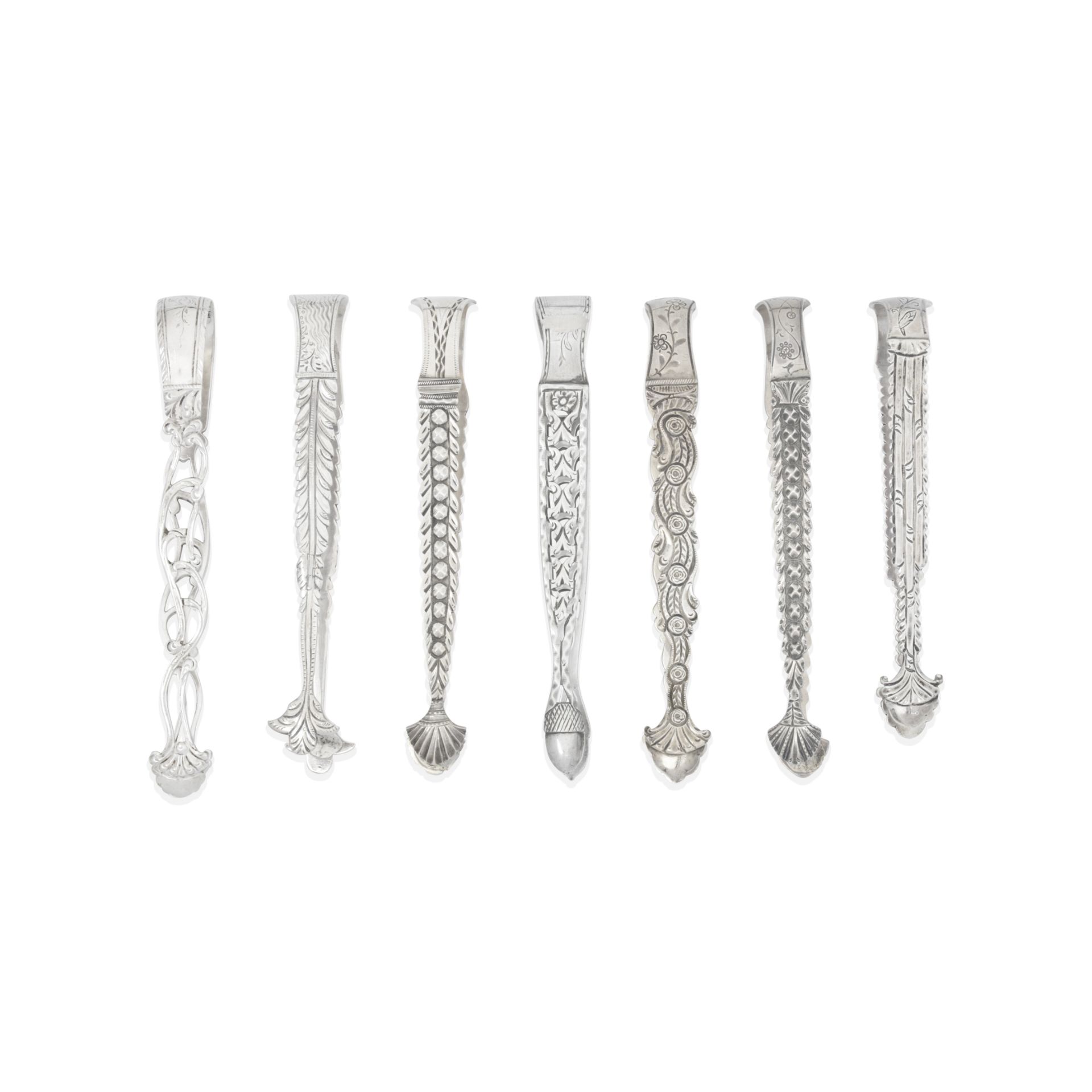 A collection of 18th century silver and mother of pearl sugar tongs (31)