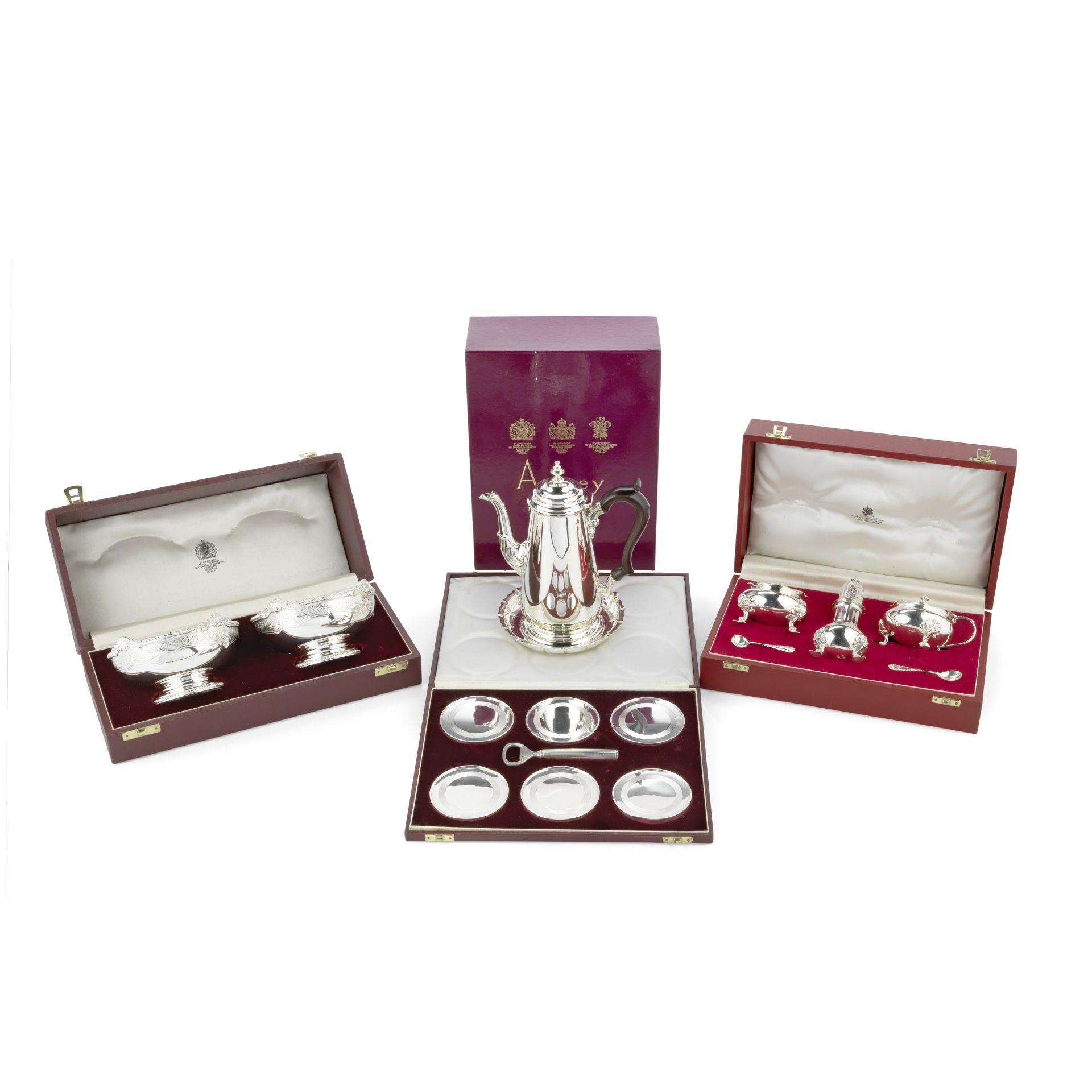 A cased coaster and bottle opener set Asprey, London 1984 / 1985 (Qty)