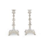 A pair of silver figural candlesticks maker's mark rubbed, with French first standard mark for Pa...