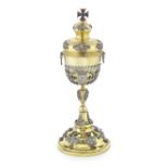 A late 19th century silver-gilt chalice with cover stamped with cross keys, stamped KOBOTH