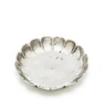 A George I Irish silver 'strawberry' form counter dish Peter Gervis (Gervais), Dublin 1715-16