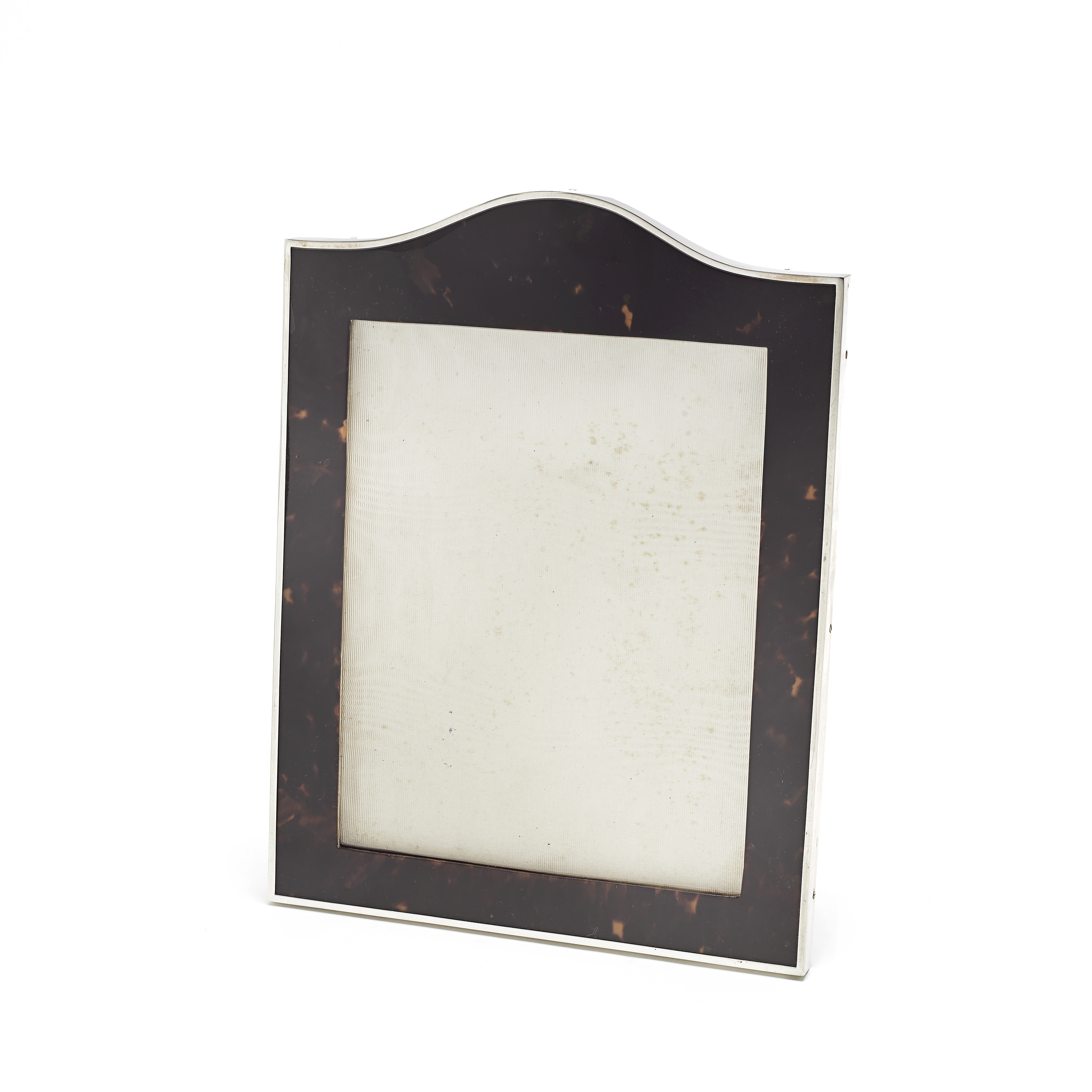 A silver-mounted tortoiseshell photograph frame Charles Dumenil, London 1919