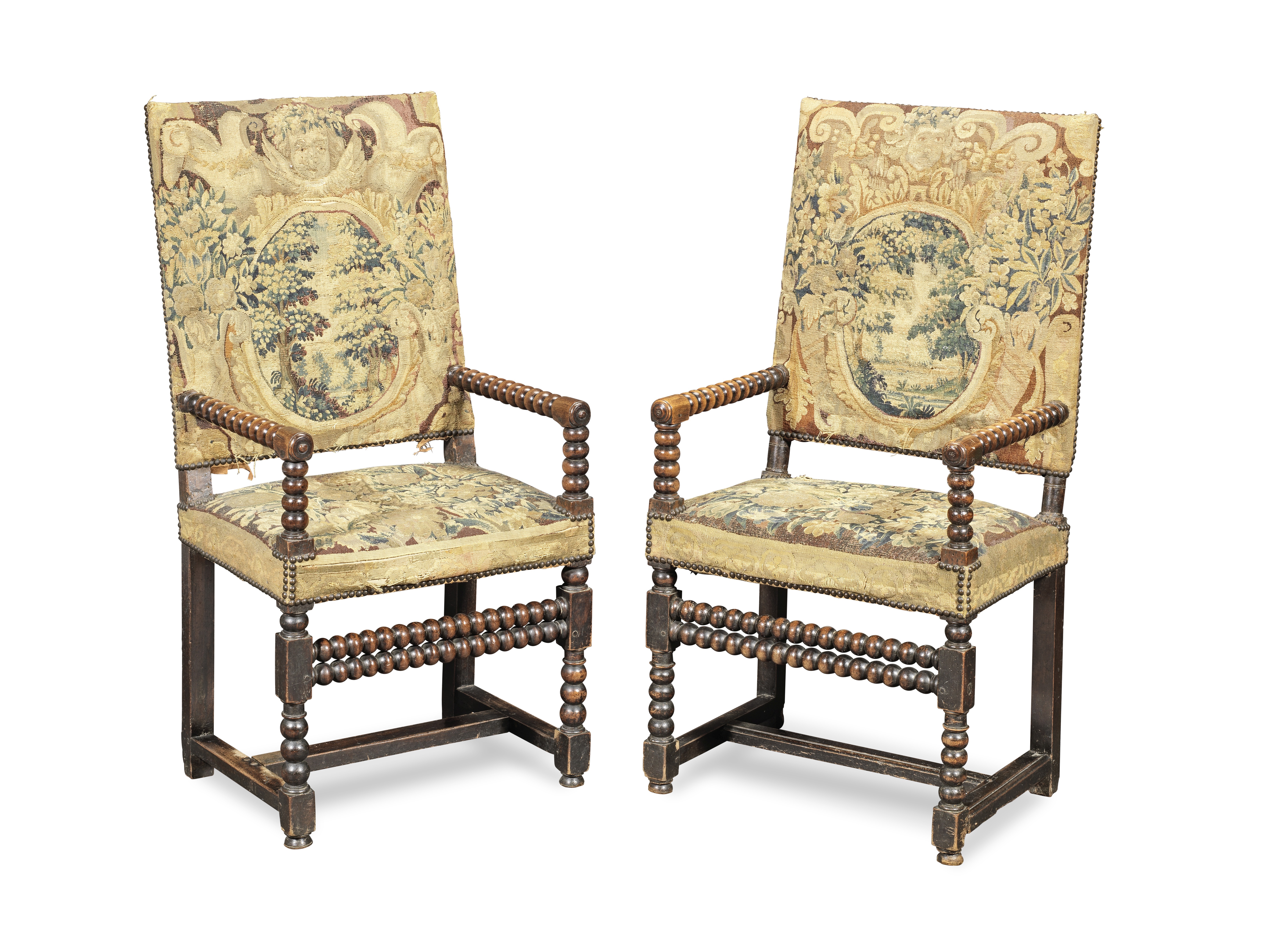 A matched pair of Franco-Flemish late 17th/early 18th century walnut fauteuils (2)