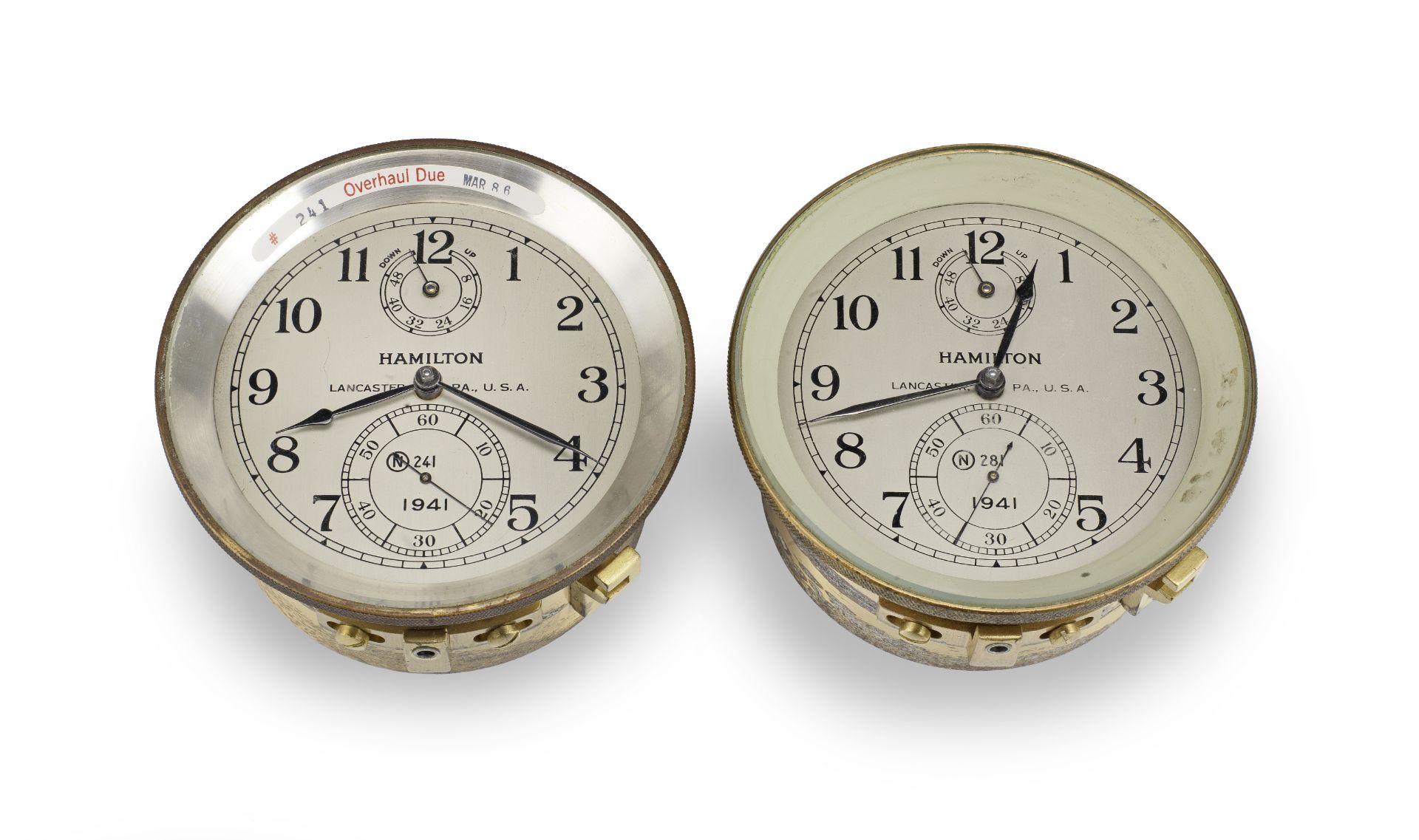Two mid 20th century American two day marine chronometer movements both signed Hamilton, numbered...
