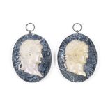 A pair of 19th century Italian 'Grand Tour' Giallo Antico marble portrait reliefs of Roman empero...