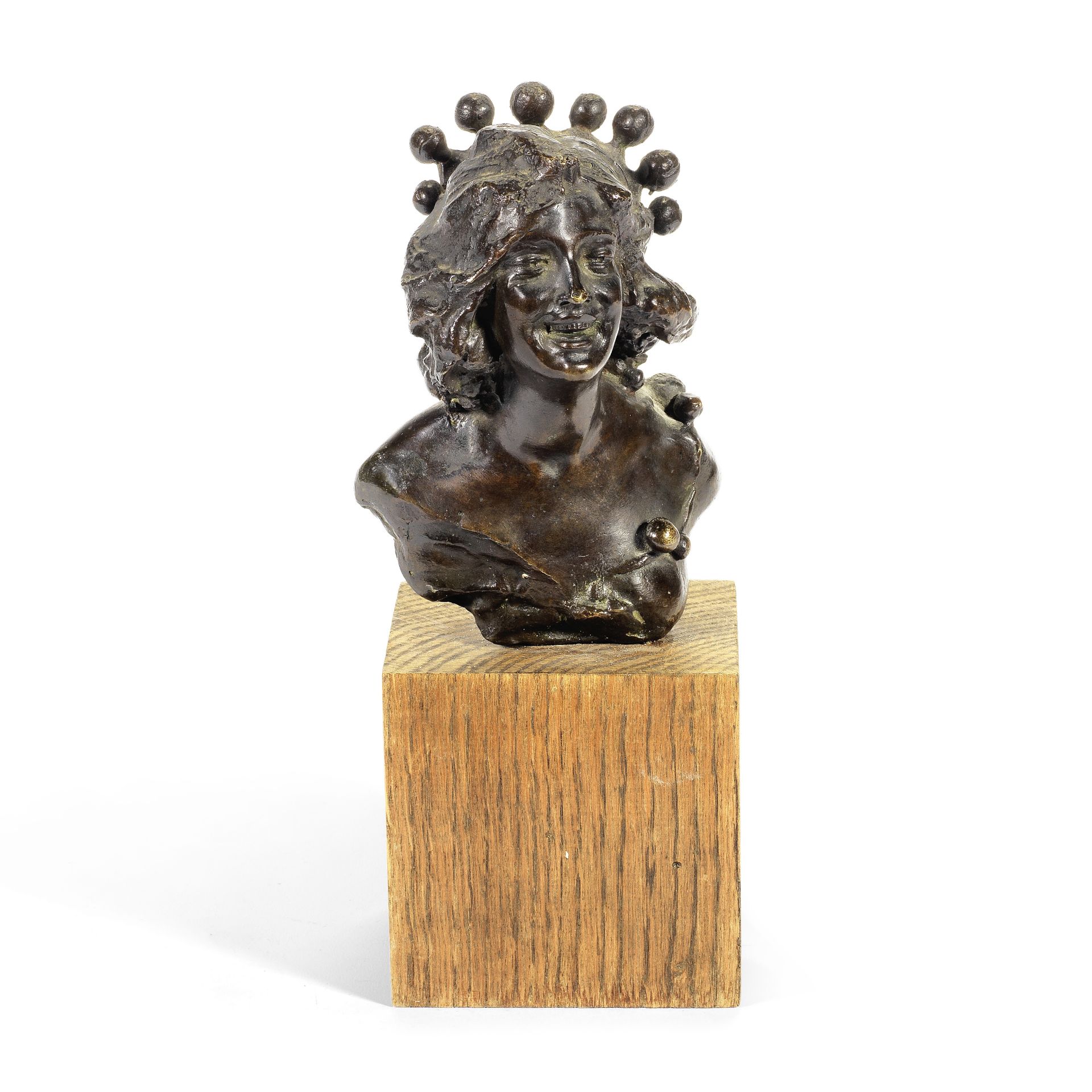 French school, late 19th / early 20th century: A small patinated bronze bust of a laughing girl