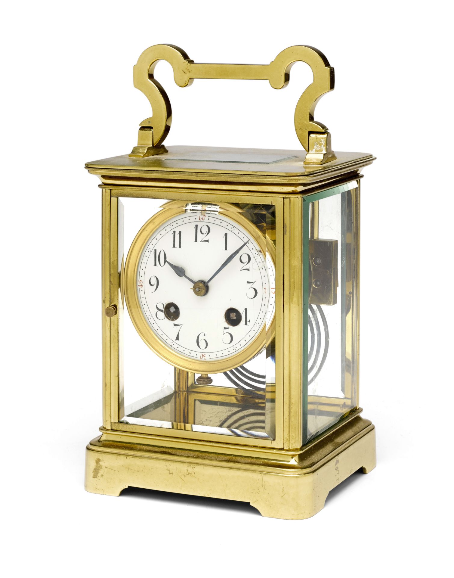 An large early 20th century brass four-glass corniche carriage clock