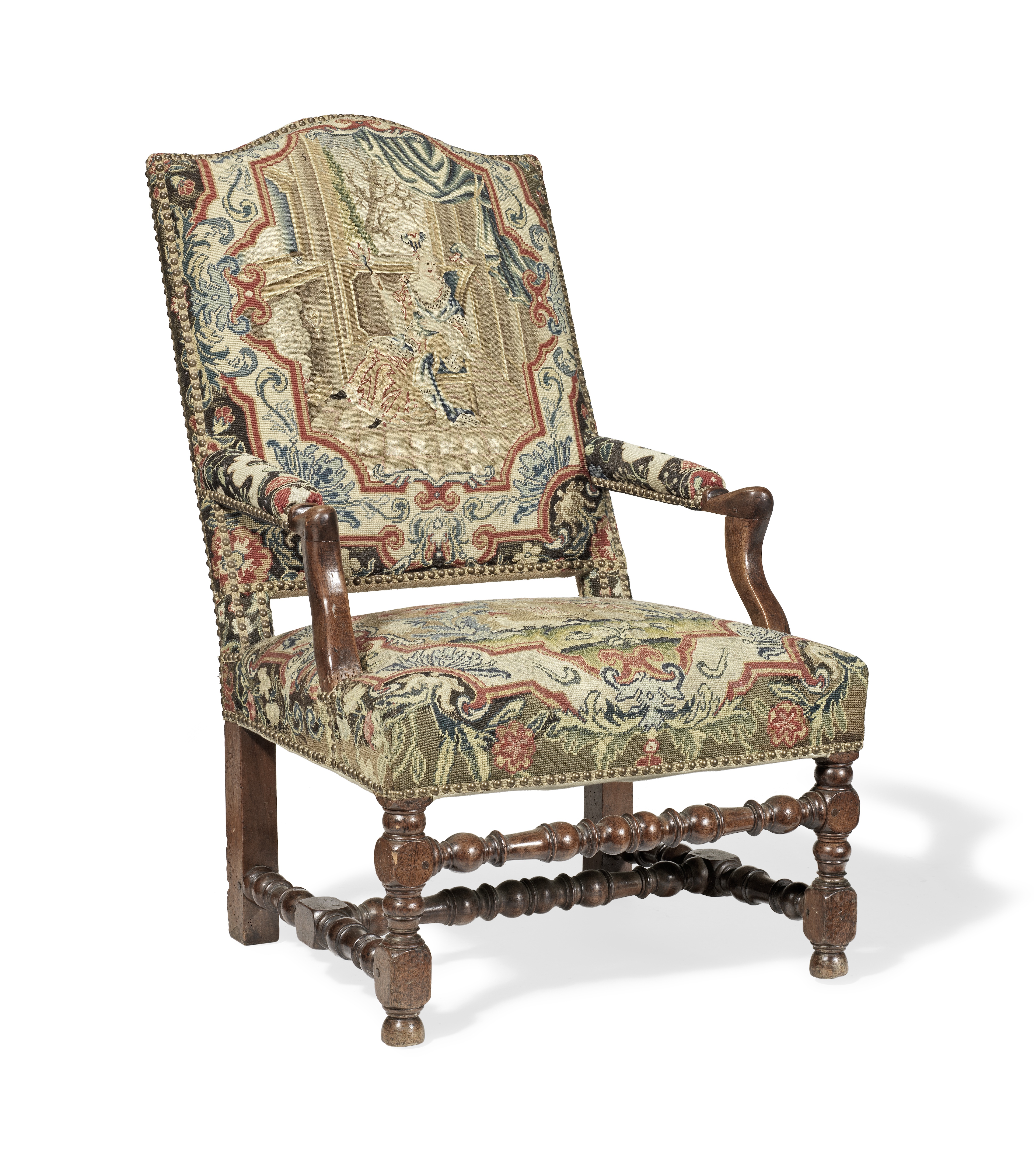 A Franco-Flemish early 18th century 'Louis XIV' walnut fauteuil a la Reine