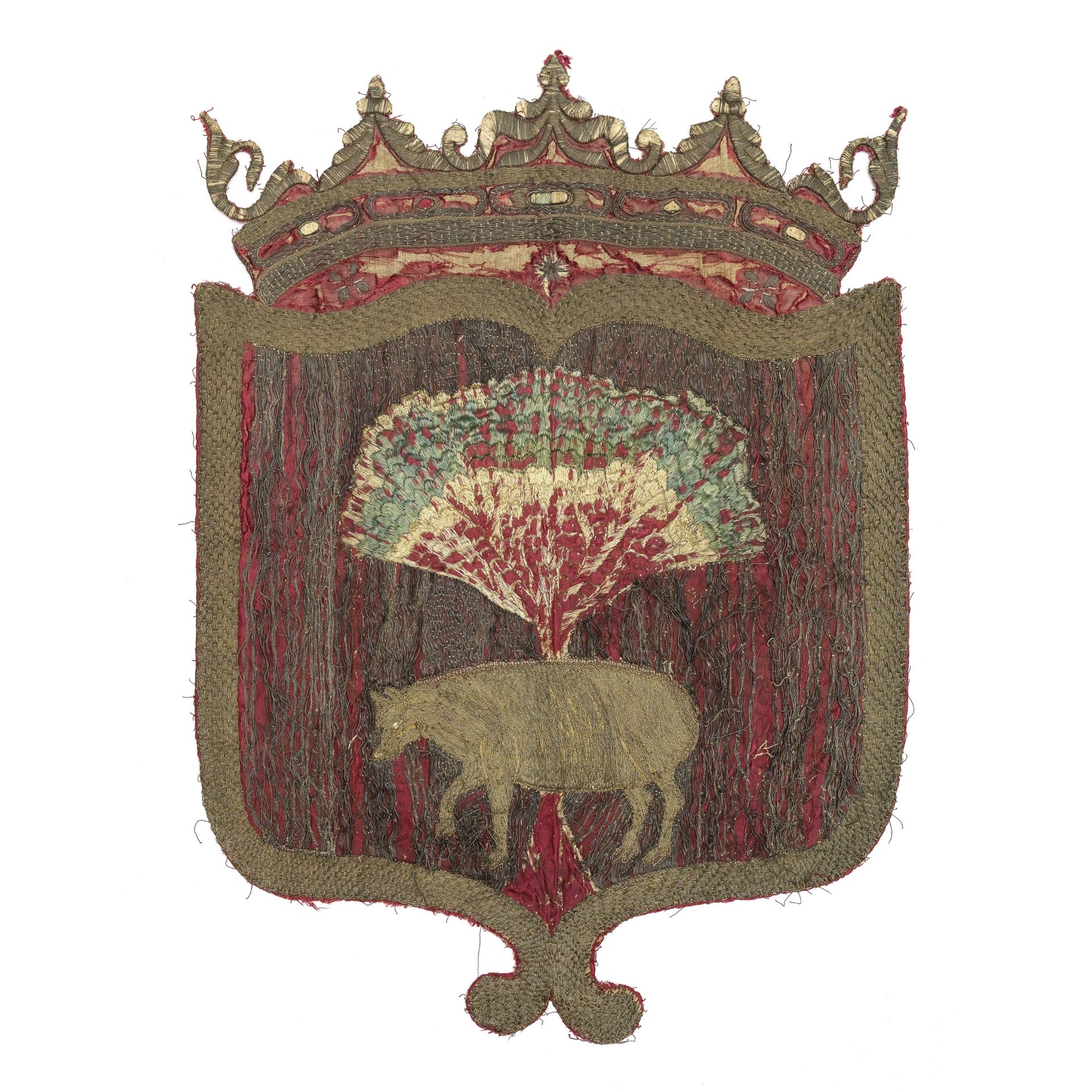 A shield shaped armorial of crimson silk 17th century, possibly French