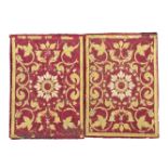 A set of four panels of crimson silk with applied woven yellow silk and blue and cream silk embro...