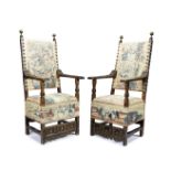 A pair of Italian Baroque walnut armchairs Late 17th century (2)