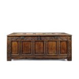 A large 17th century carved oak coffer