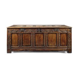 A large 17th century carved oak coffer