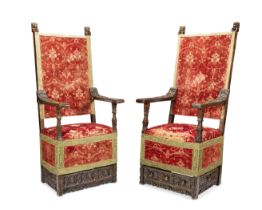 A pair of Italian carved walnut armchairs 17th century (2)