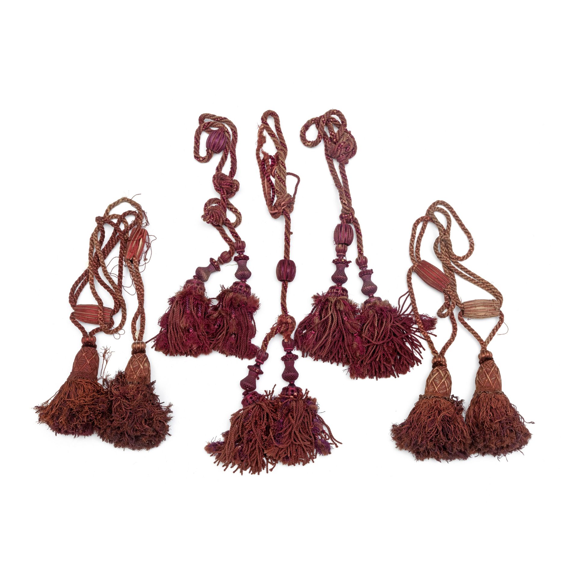 Two pairs of claret tie-backs 19th century