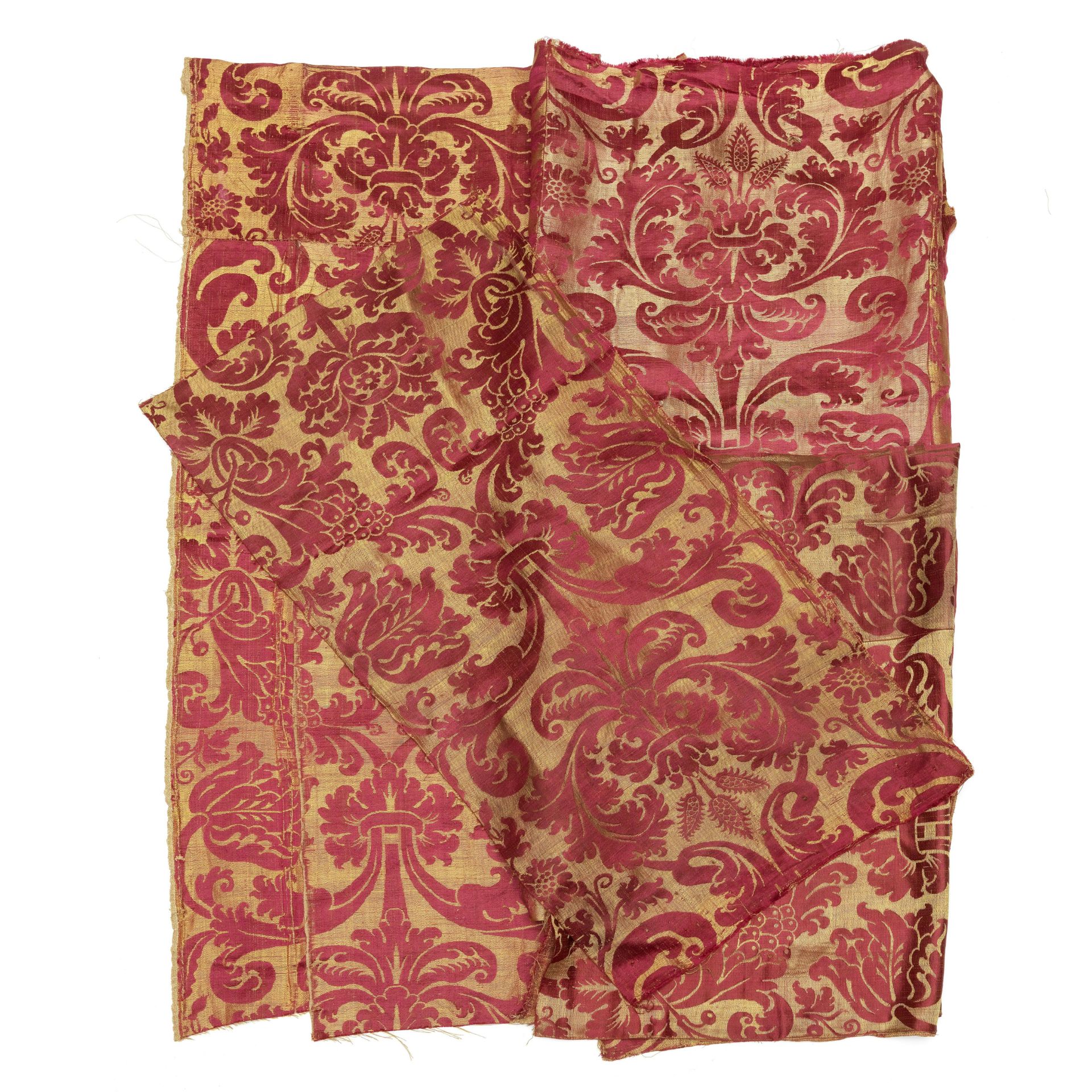 A pelmet of 17th century red and cream silk and linen brocatelle ((Qty))