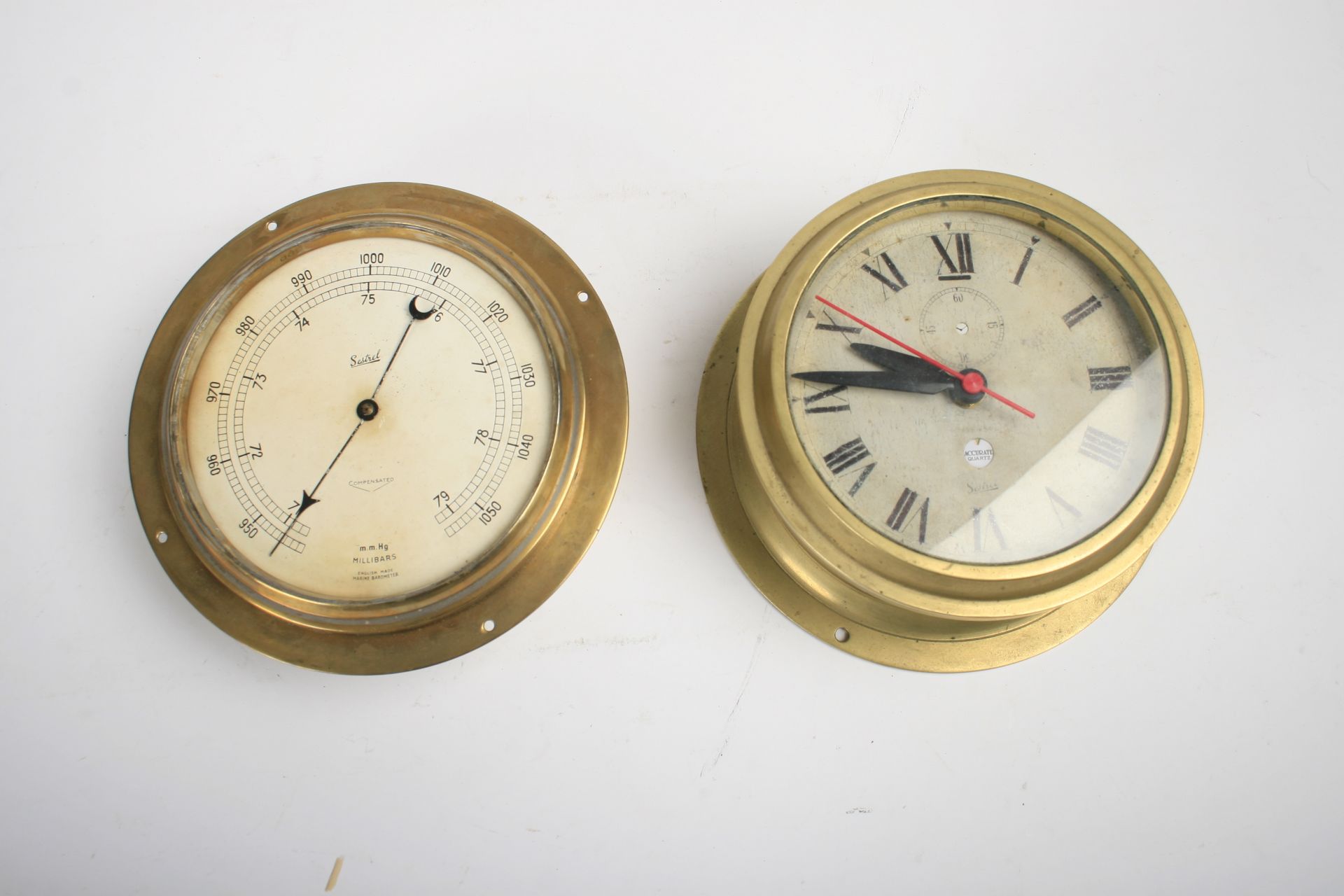 A Sestrel marine clock and a barometer, ((2))
