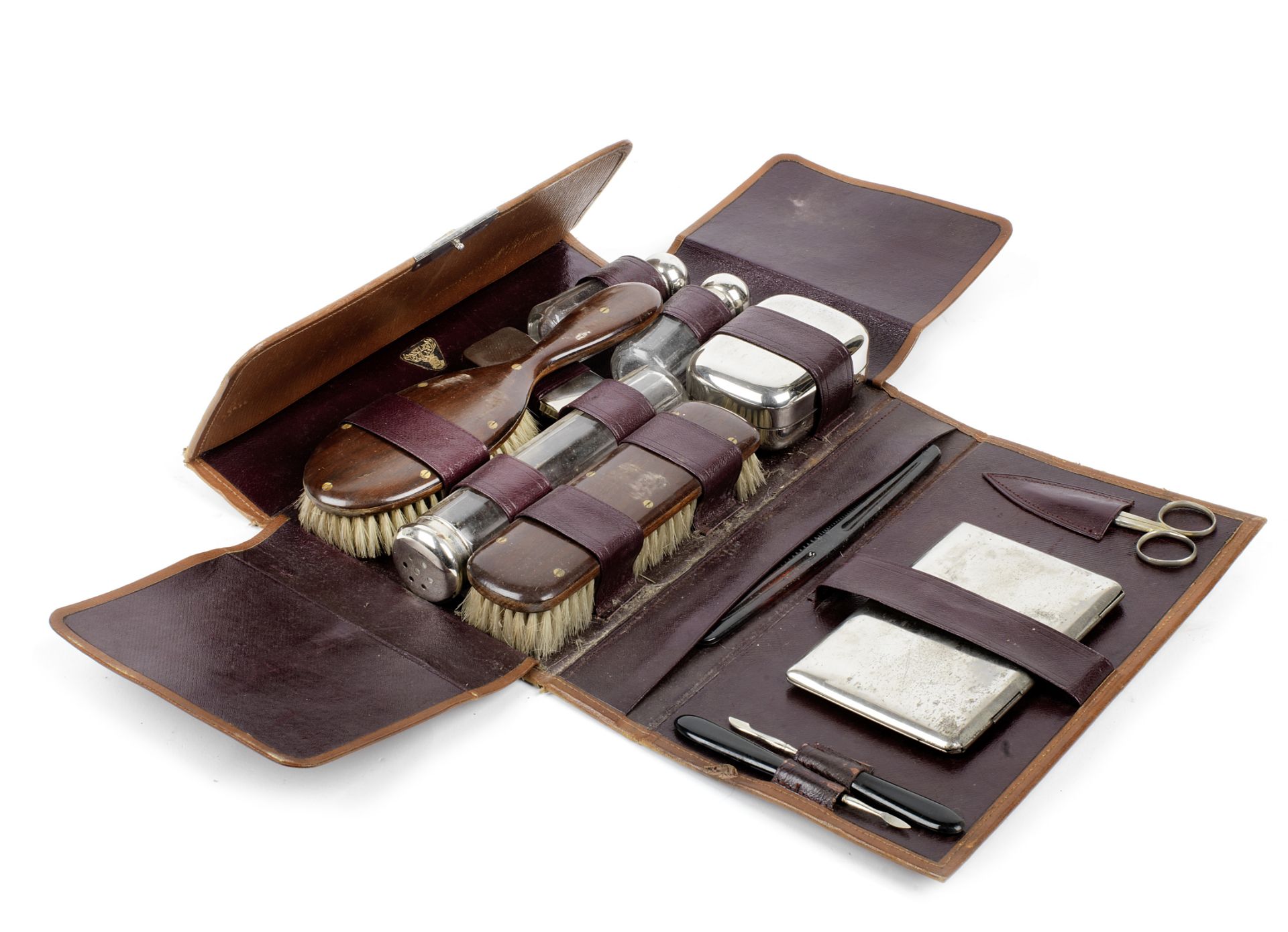 A Bentley-badged cased vanity set by Antler,