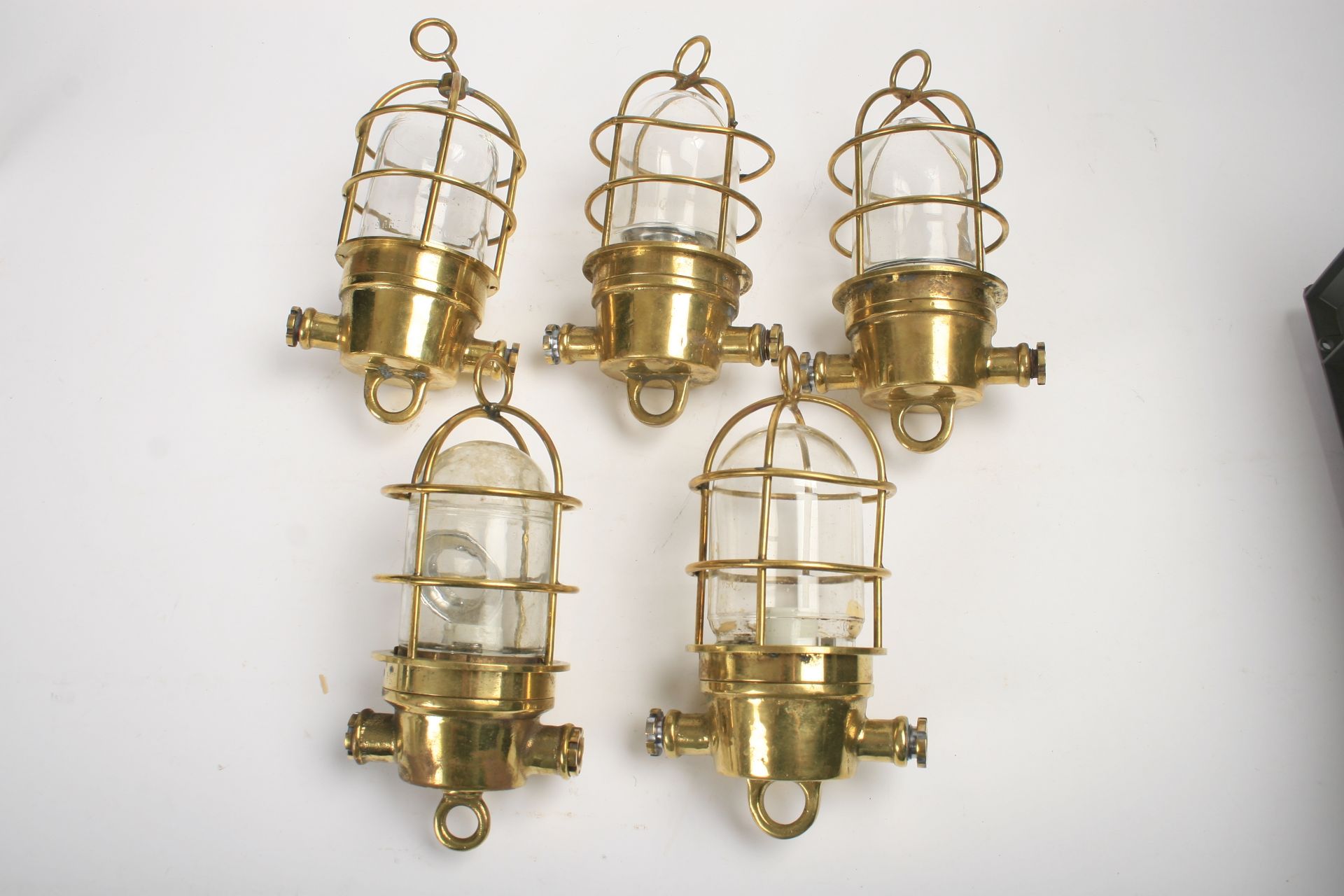 Five electric brass bulkhead lamps, ((5))