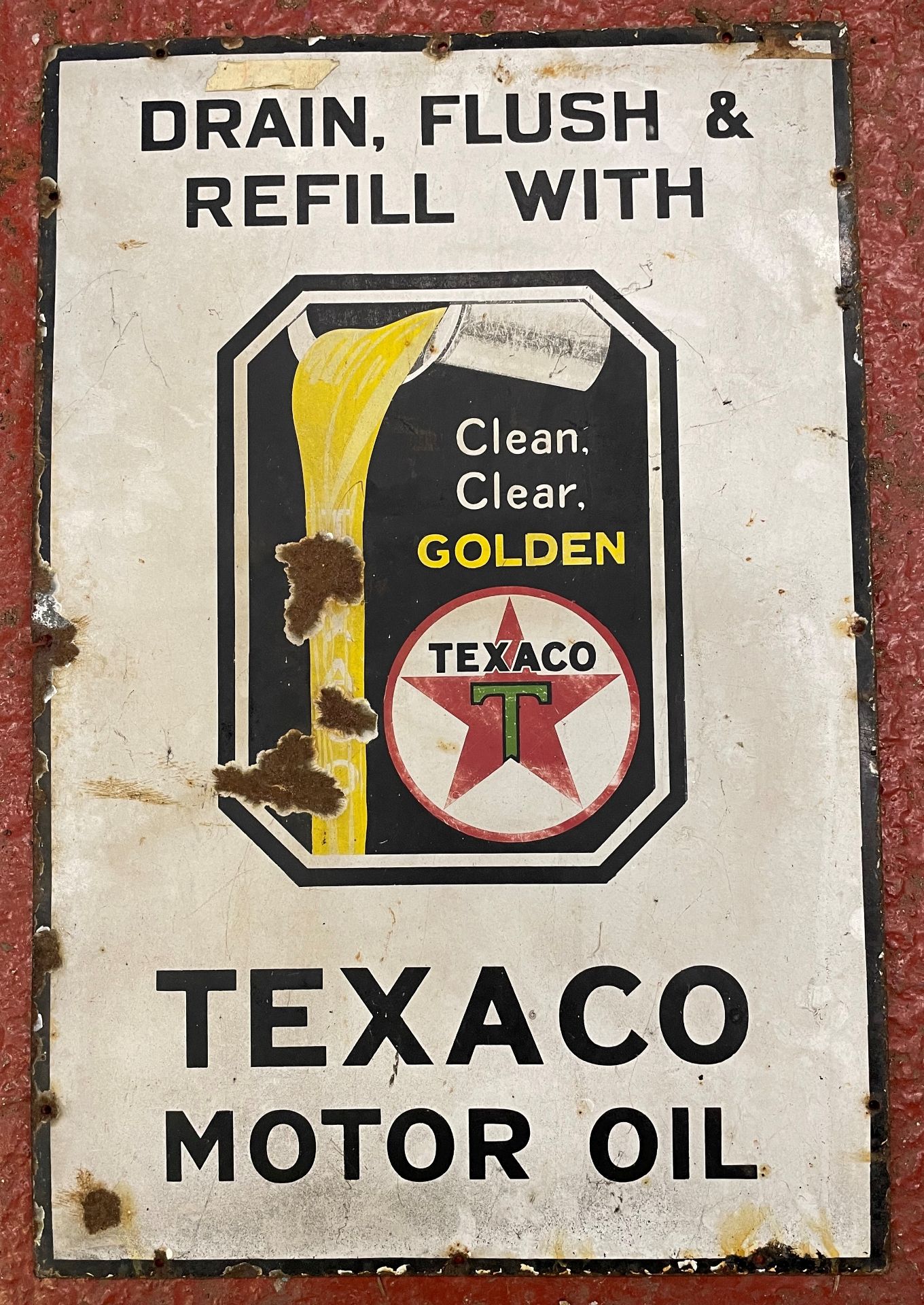 A Texaco motor oil 'Drain, Flush and Refill with...' enamel sign,