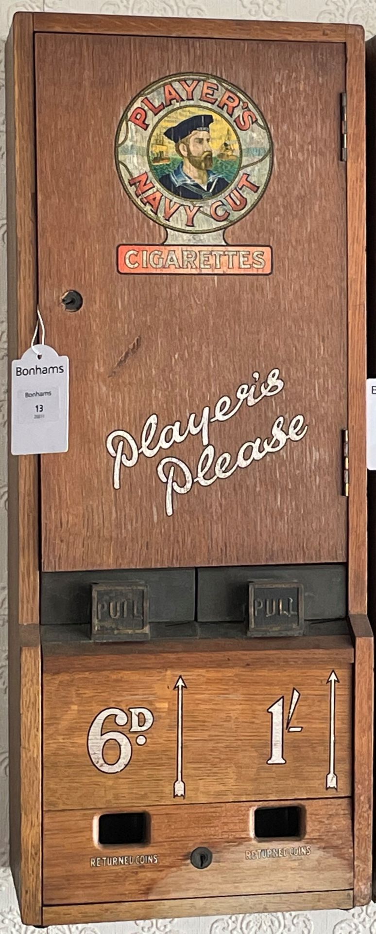 A 'Players Navy Cut' cigarettes dispenser,