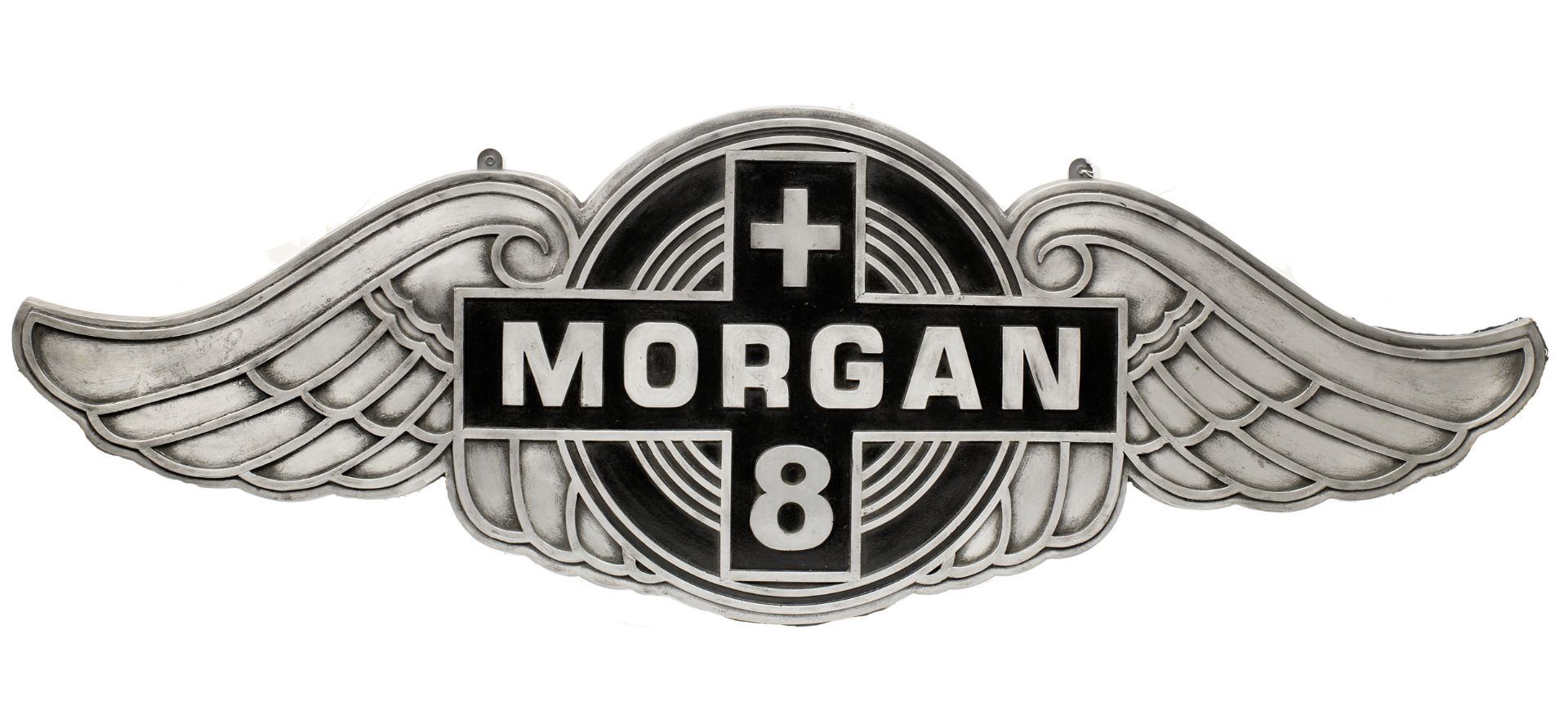 A 'Morgan+8' garage display emblem,