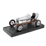 A 1:8 scale model of a single seat racing car,