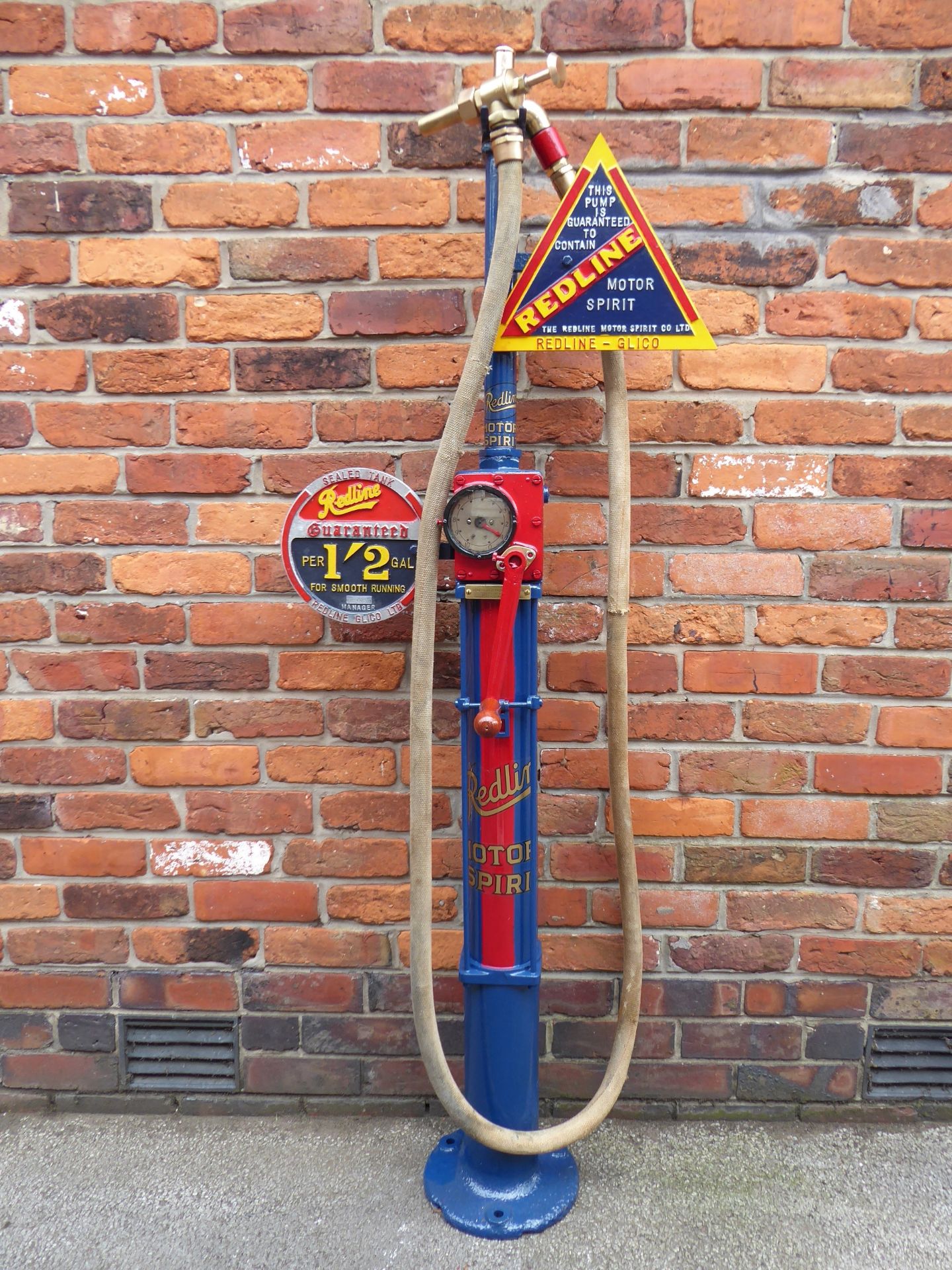 An early Vickers Armstrong one gallon hand-operated petrol pump,