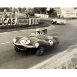 Seven framed and signed Edward Eves motor racing photographs, ((8))