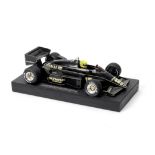 A 1:12 scale model of Ayrton Senna's 1985 Portuguese and Belgian Grand Prix winning Lotus-Renault...