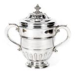 A large sterling silver trophy by William Comyns & Sons Ltd of London 1928, ((4))