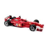 A 1:5 scale limited edition model of Michael Schumacher's Ferrari F2001 Grand Prix Championship w...