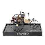 A 1:8 scale model of the 1886 Benz Motorwagen,