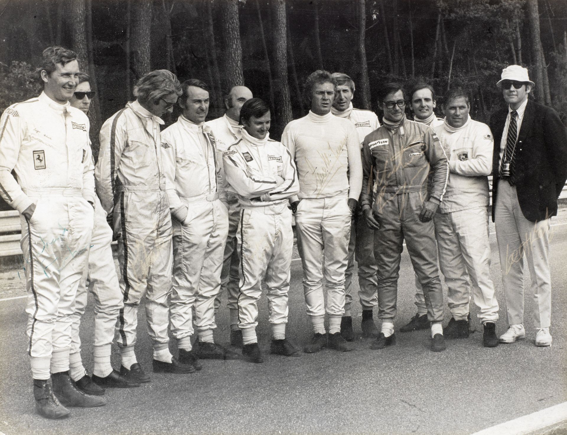 A Steve McQueen signed Le Mans film stunt drivers publicity image, ((12))