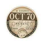 A UK tax disc issued to the James Bond 'Goldfinger' Aston Martin DB5 and signed letter of authent...