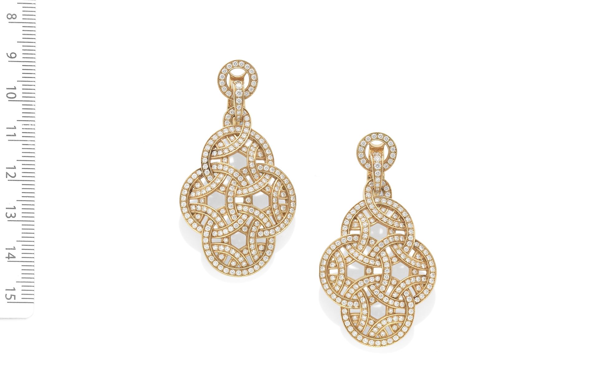 CARTIER: GOLD AND DIAMOND EARCLIPS