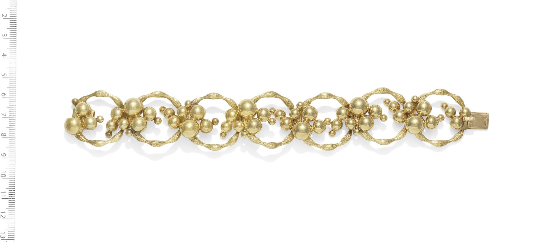 TEXTURED CIRCULAR LINK BRACELET, CIRCA 1970