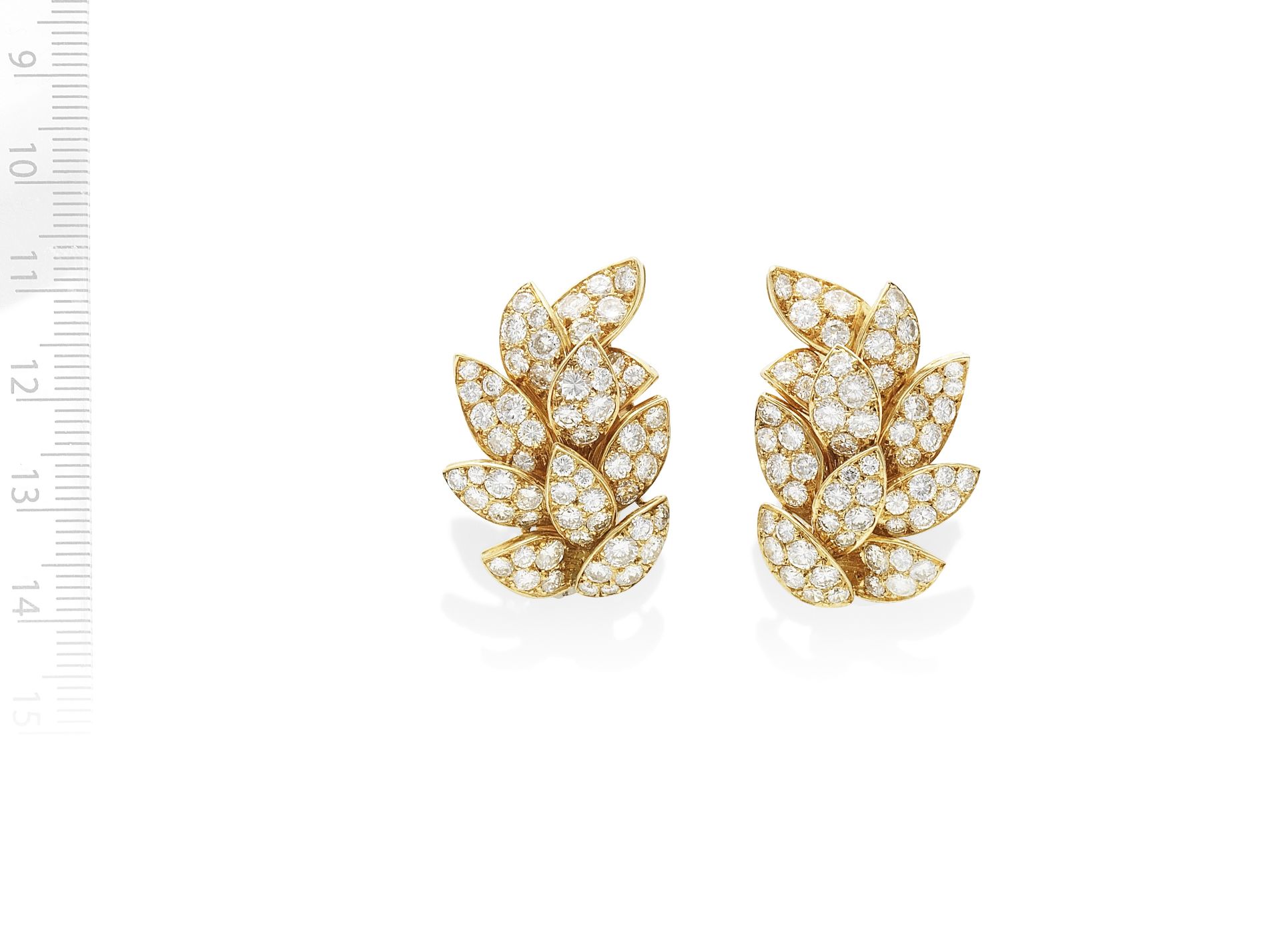 VAN CLEEF & ARPELS: DIAMOND-SET LEAF EARCLIPS, CIRCA 1965