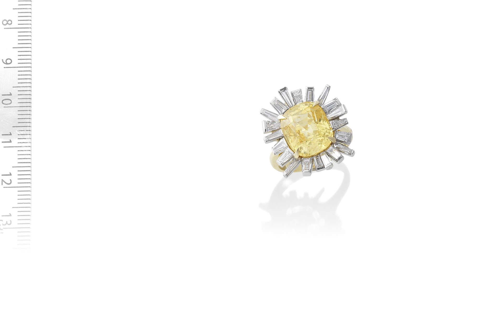 YELLOW SAPPHIRE AND DIAMOND RING, CIRCA 1970