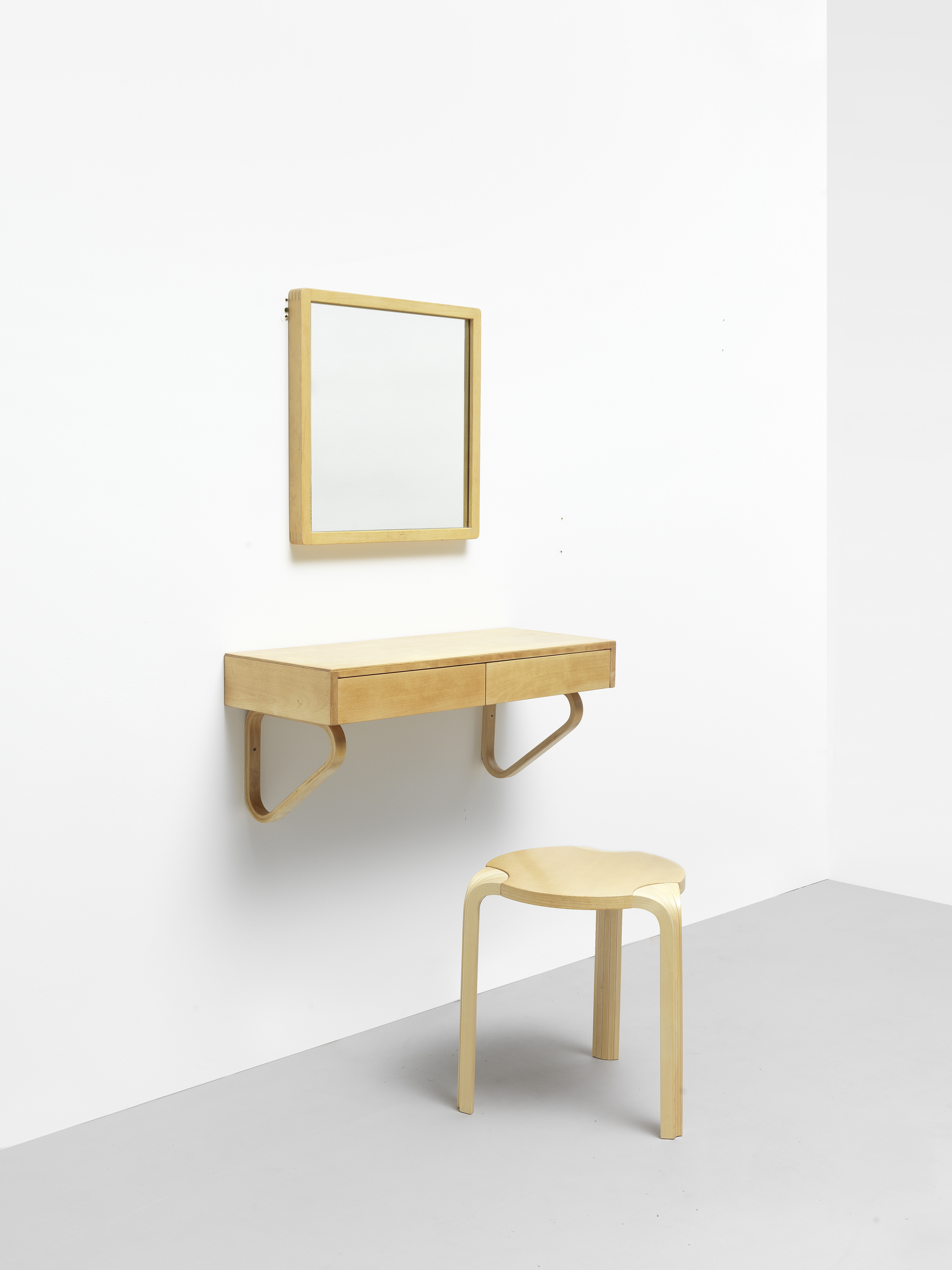 Alvar Aalto Mirror, model no. 50510, wall-mounted drawer unit, model no. 114, and 'X-Legs' stool,...