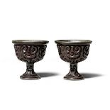 A PAIR OF CARVED TIXI LACQUER STEM CUPS 16th century (2)