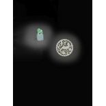 A SMALL JADEITE 'BUDDHIST LION' SEAL AND A WHITE JADE OPENWORK PENDANT The seal 19th/early 20th c...