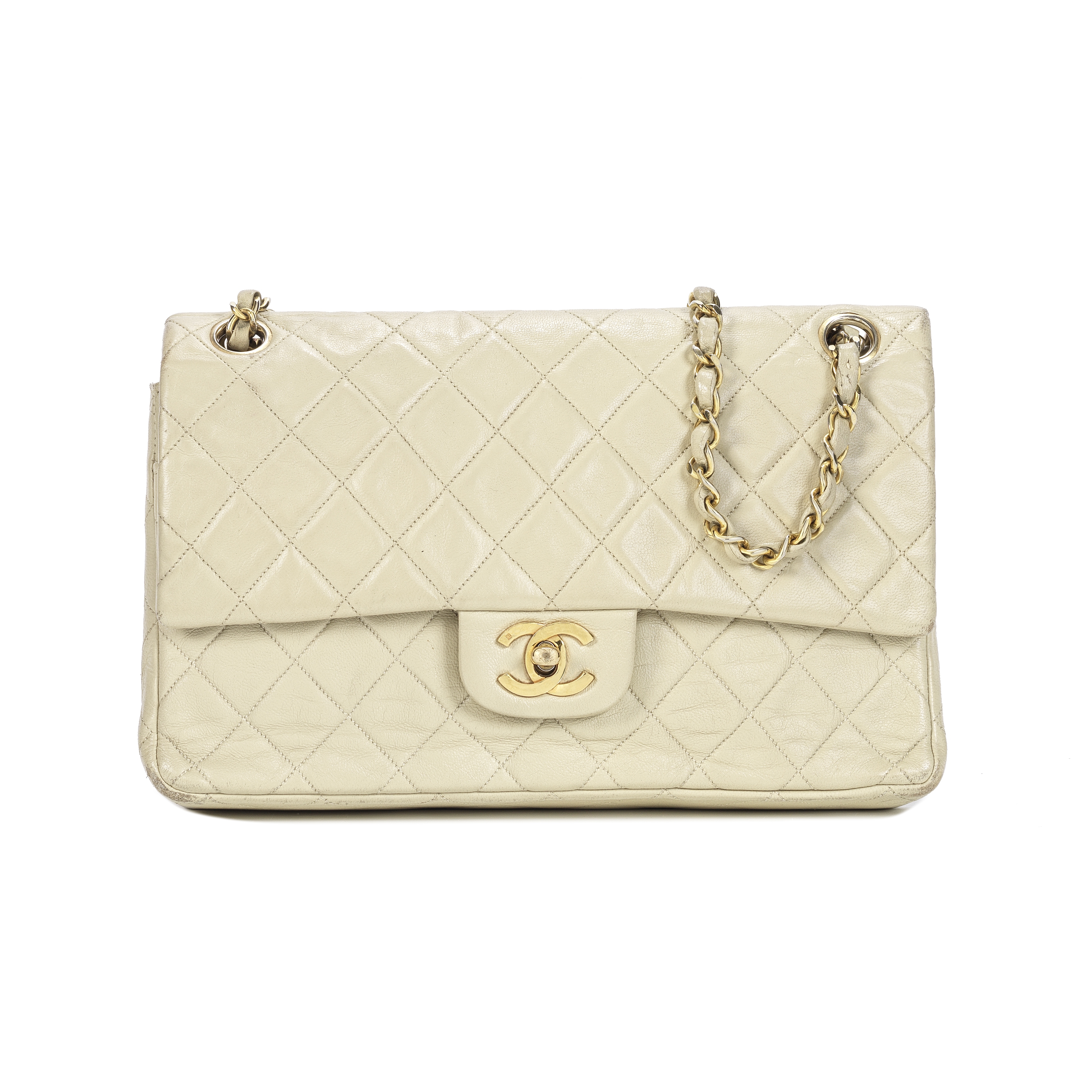 A BEIGE MEDIUM CLASSIC DOUBLE FLAP BAG Chanel, early 1980s