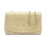 A BEIGE LAMBSKIN MEDIUM DIANA SINGLE FLAP BAG Chanel, 1991-94 (includes authenticity card but mis...