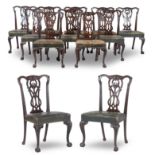 A Set of Twelve George II style Mahogany dining Chairs by Marsh, Jones and Cribb of Londoncirca 1...