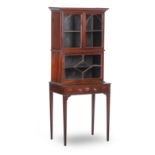 A late Victorian mahogany glazed double cabinet